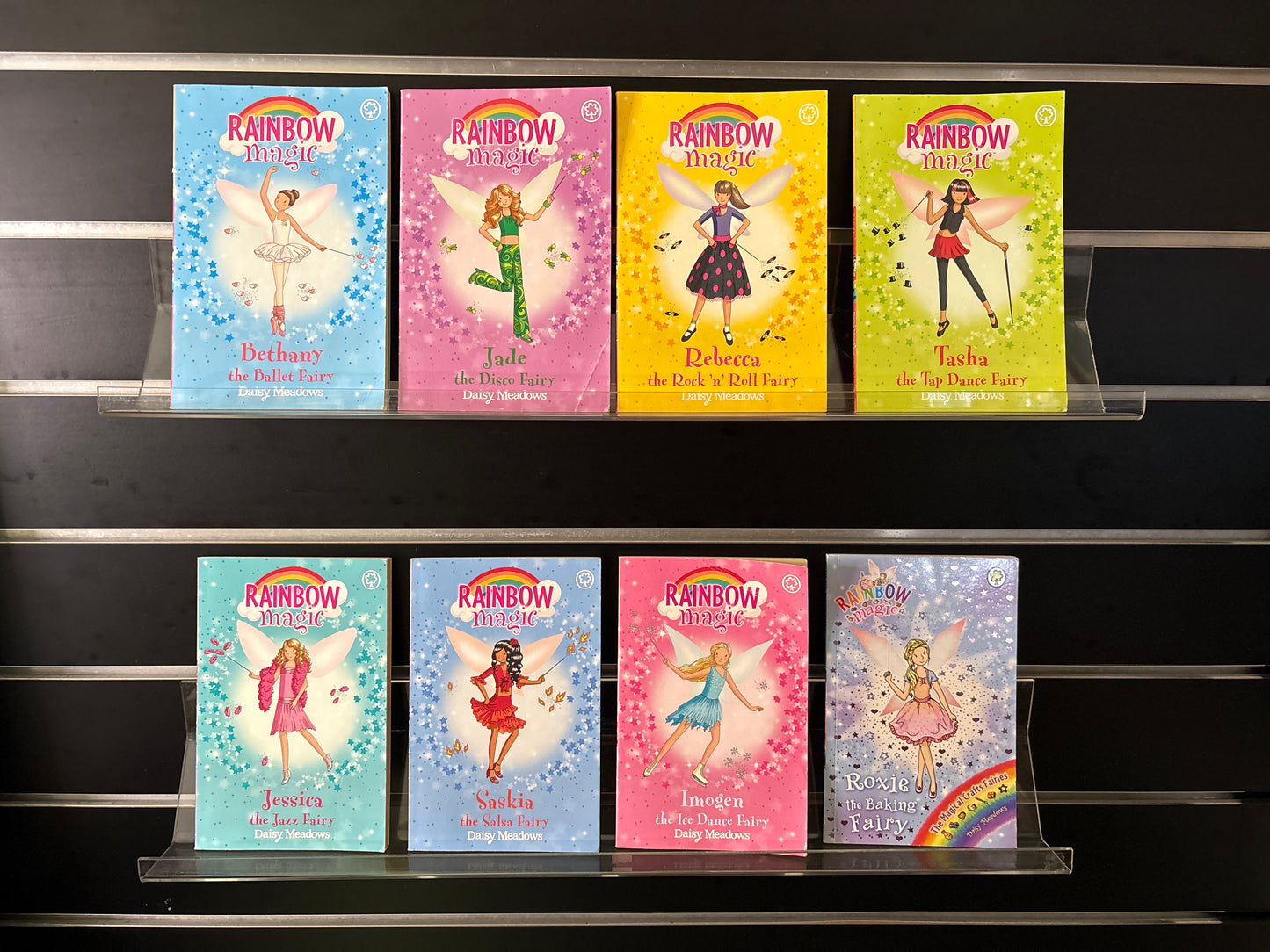 MEADOWS, Daisy - Bundle of 8 - #1-7 in The Rainbow Magic Fairies Series (Min. fair condition)