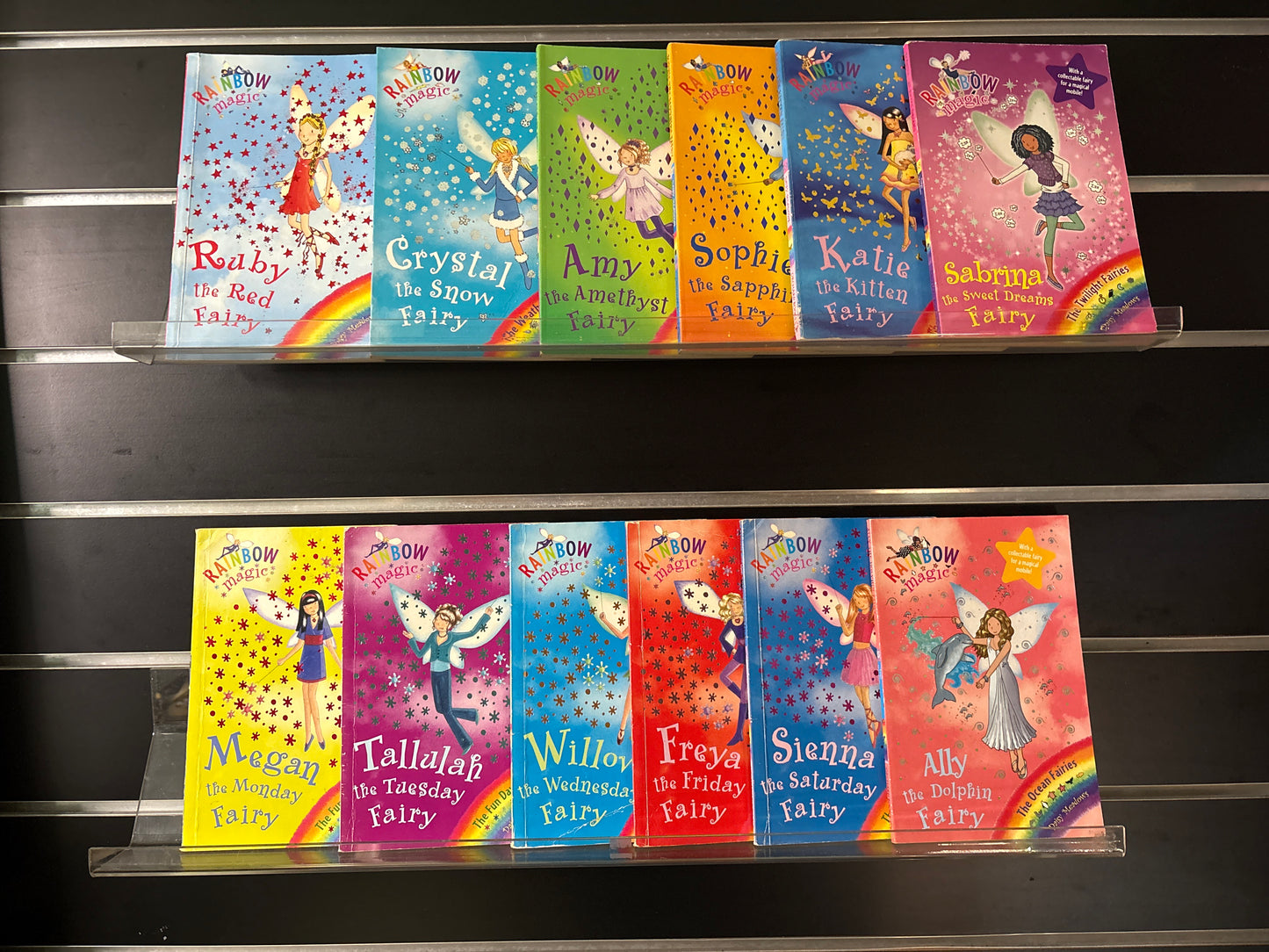 MEADOWS, Daisy 'Rainbow Magic Fairies' Assorted Titles Bundle of 12 (Min. fair condition)